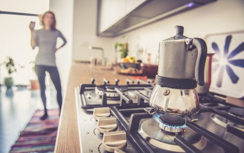 Time for coffee, woman Cooking morning coffee at home.